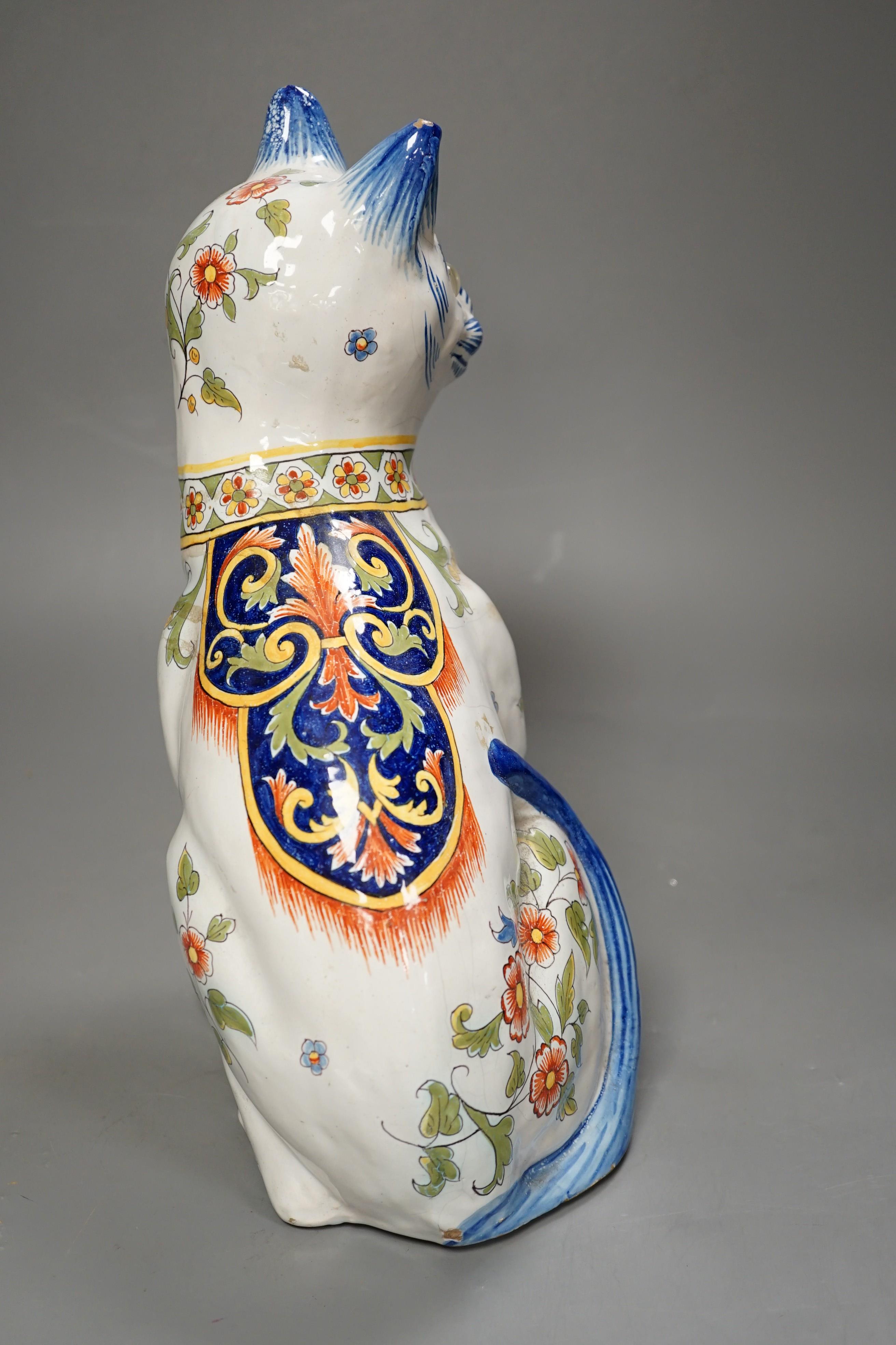 A Mosanic faience model of a seated cat, 31cms high